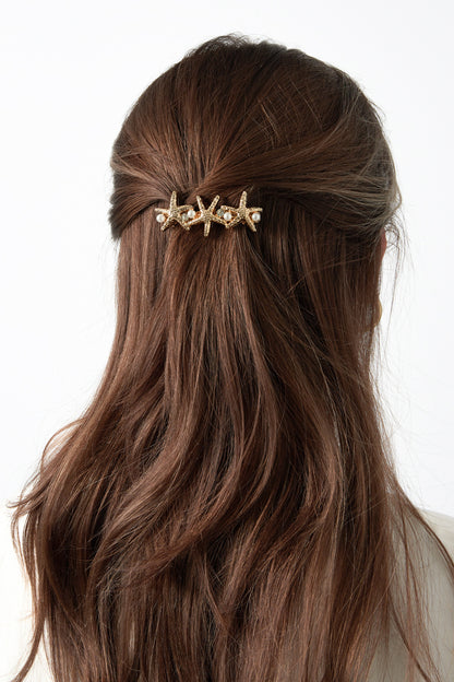 Row of starfish haarclip
